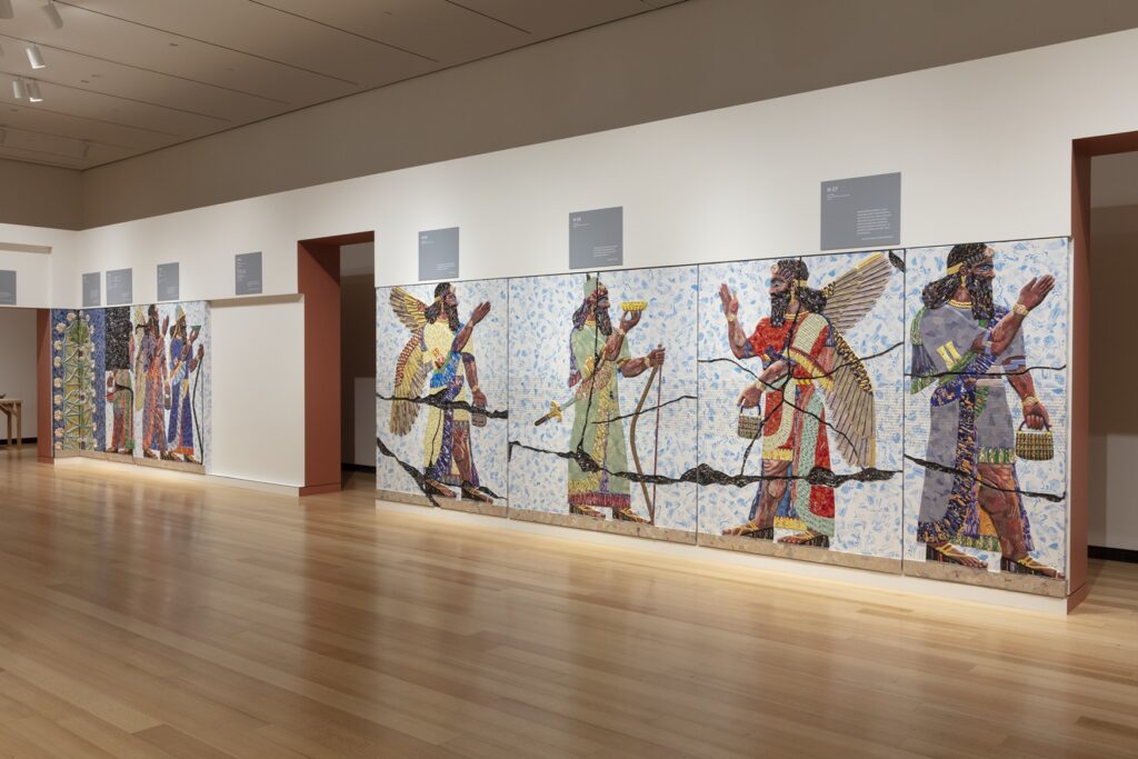 Image of artwork from the Michael Rakowitz: Nimrud exhibit. Depicts several murals of men.